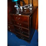 A Mahogany three drawer filing cabinet - 27" depth x 21½" wide x 43½" high.