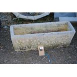 A concrete Planter - 30" wide x 10" depth x 10" high.