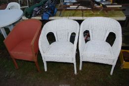 Three 'Lloyd loom' style chairs.