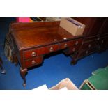 A Walnut/Mahogany kneehole dressing table with drawers - 45" wide x 21" depth x 31" high.