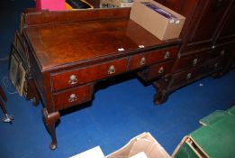 A Walnut/Mahogany kneehole dressing table with drawers - 45" wide x 21" depth x 31" high.