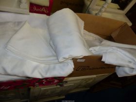 Two boxes of white catering table linen - large sizes.