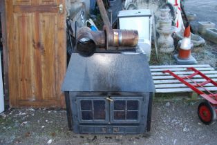 A large Woodburner with back boiler and pipe work - 32" wide x 18" depth x 33" high.