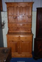 A modern pine dresser - 37" wide x 17½" depth x 79" high.