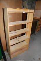 A six shelf pine bookcase - 2' wide x 49" high x 8" depth.