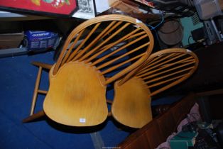 Four stickback dining chairs.