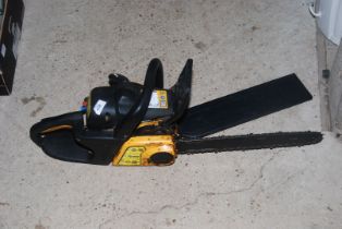 A McCullough Chainsaw with chain brake (working at time of lotting).