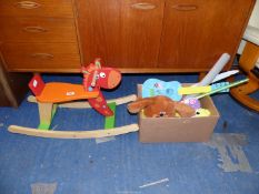 A wooden Rocking Horse and box of toys, incl Hey Dougie Dancing Dog.