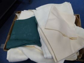 Ivory catering table linen, plus green napkins etc.