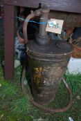 Oil bucket with pump.