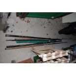 A quantity of fishing rods, including a Farlows strand of London fishing rod.