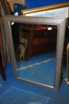 A large silver metal surround mirror - 29½" x 41½".