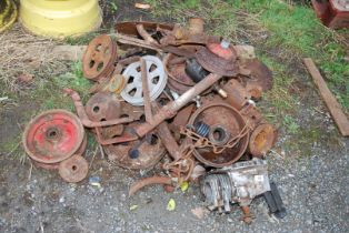 A quantity of metal pulleys, and gate hinges, etc.