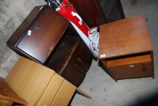 A small Bureau and a bedside cupboard.