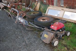 A 'Honda' 4 stroke Mower (running at time of lotting)