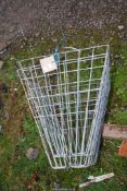 Two wire mesh over hurdle Hayrack's.