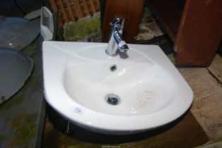 Small hand basin and tap.