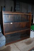 A wooden shelving unit with sliding top doors - 3' wide x 8½" depth x 3' High.