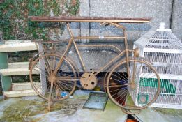 A table with a Bicycle base.