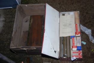 A Wooden box, a First-aid tin including contents.