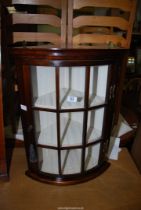 A glazed corner Cabinet with shelves - 26" high x 20" depth.