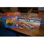 A 'Fisher price' elevator garage, and a mighty metro Scalextric.