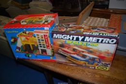 A 'Fisher price' elevator garage, and a mighty metro Scalextric.
