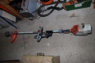 A 'Stihl' strimmer with bump feed.