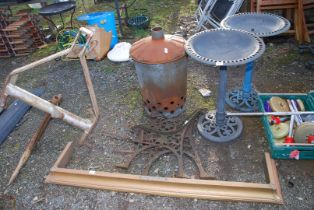 Bench-ends, Fire kerb, two plastic Bird bath's, and Incinerator bin.