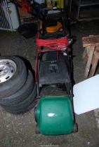 A 'Qualcast' Electric-mower, with spare grass-box.