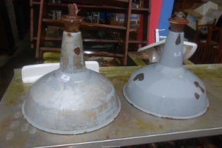 Enamel industrial light shades.