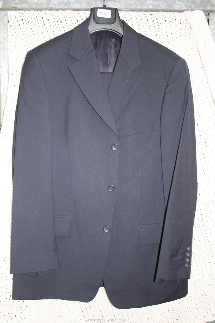 A gents dark navy blue Jaeger Suit with single breasted jacket, 52R and trousers 50R.