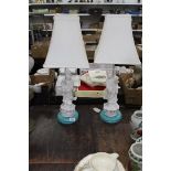 A pair of Blanc De Chine table Lamps with shades, 26 1/2" high overall.