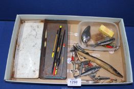 A tray containing vintage fishing lures, Devon minnows, floats, spinners, etc.
