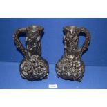 A pair of chalk ewer/Vases in black with applied flower and foliage decoration, 10 1/2" tall,