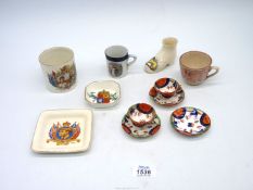 A small quantity of china to include; miniature tea cups and saucers,