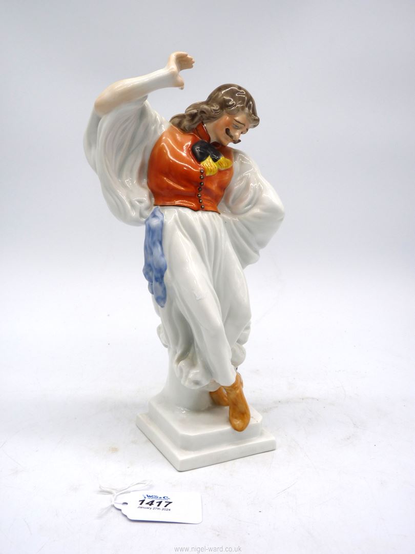 A Herend hand painted figure of a hatless male dancer in traditional costume, 11 1/4'' tall.