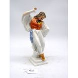 A Herend hand painted figure of a hatless male dancer in traditional costume, 11 1/4'' tall.