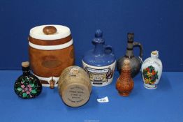 A quantity of spirit dispensers to include; Scotch Whisky barrel, Whiteway's Vintage Cyder,