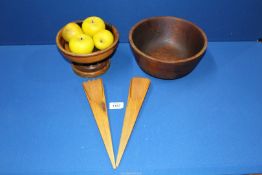 A treen salad bowl and servers plus treen footed bowl with ceramic pears and apples.