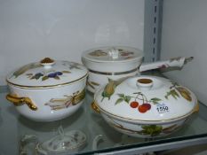 Three pieces of Royal Worcester 'Evesham', two tureens and a saucepan.