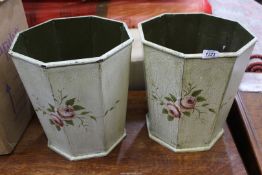 A pair of cream finish wooden tapering octagonal waste paper bins with pink rose details,