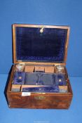A Walnut vanity/writing Box, with blue velvet lined interior, two perfume bottles (one badly a/f),