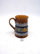 A Doulton Lambeth stoneware Art Nouveau tankard decorated with birds, 5 1/4" tall.