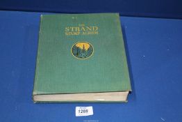 A very full Strand stamp album including stamps from New Zealand, Belgium, etc.