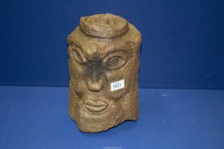 A heavy modernist carved stone head, 10 3/4" high.