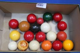 A quantity of miscellaneous snooker and billiard balls (not a full set).