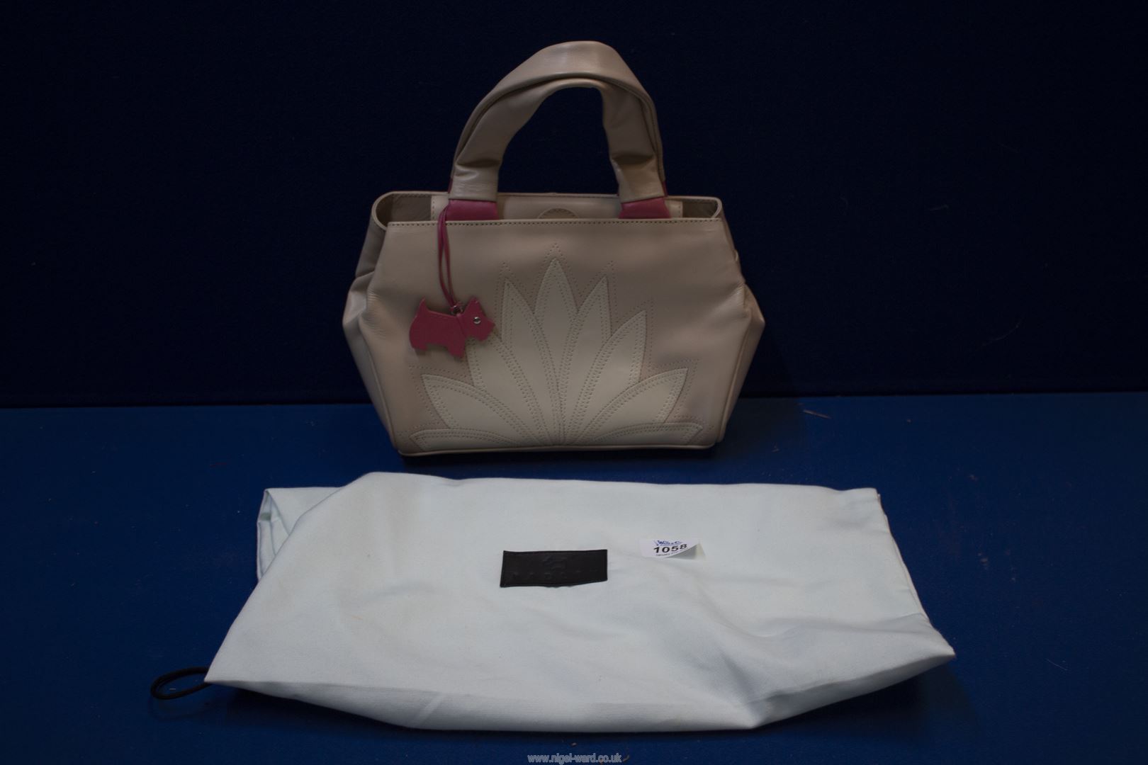 A Radley pale pink and cream Handbag with lotus pattern, with dust cover bag.