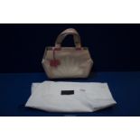 A Radley pale pink and cream Handbag with lotus pattern, with dust cover bag.