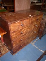 A Mahogany Chest of three long and two short Drawers having turned wooden knob handles,